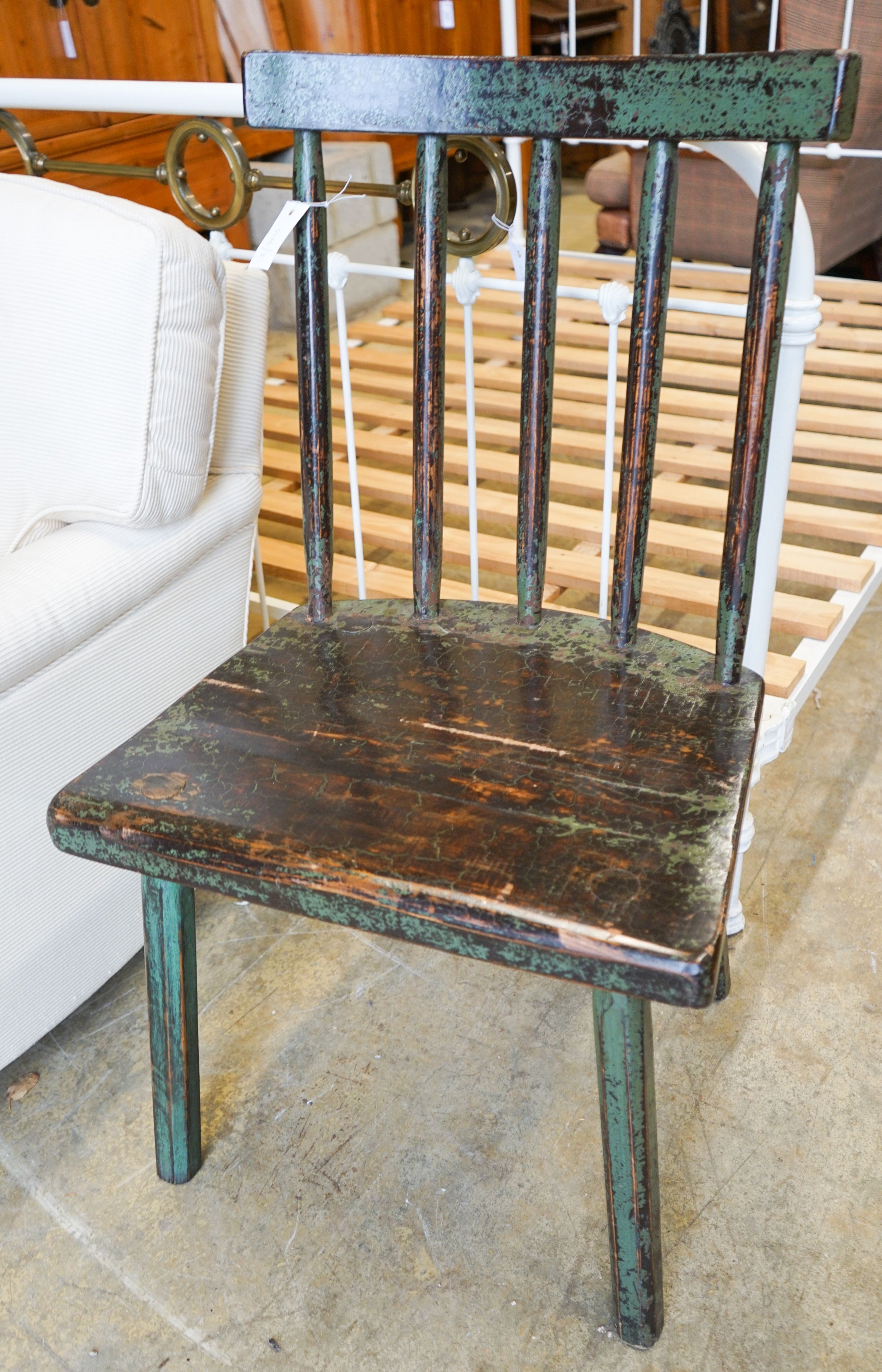 A painted primitive style comb back side chair, width 55cm, depth 45cm, height 94cm